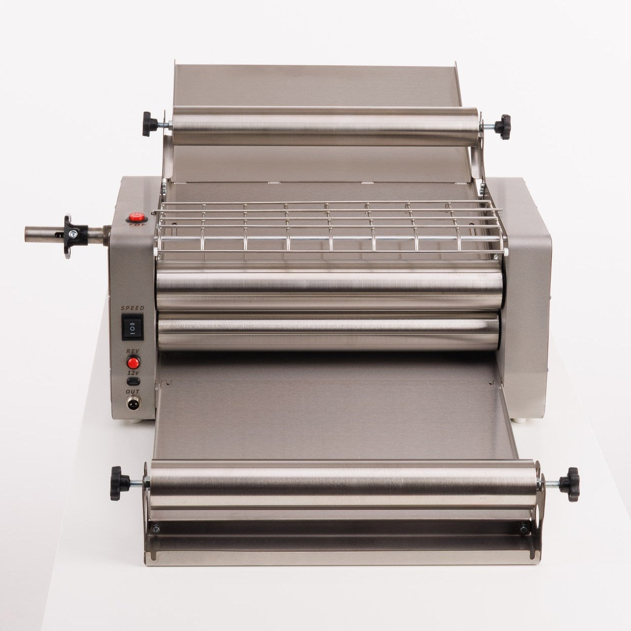 Stainless steel dough sheeter on a white background