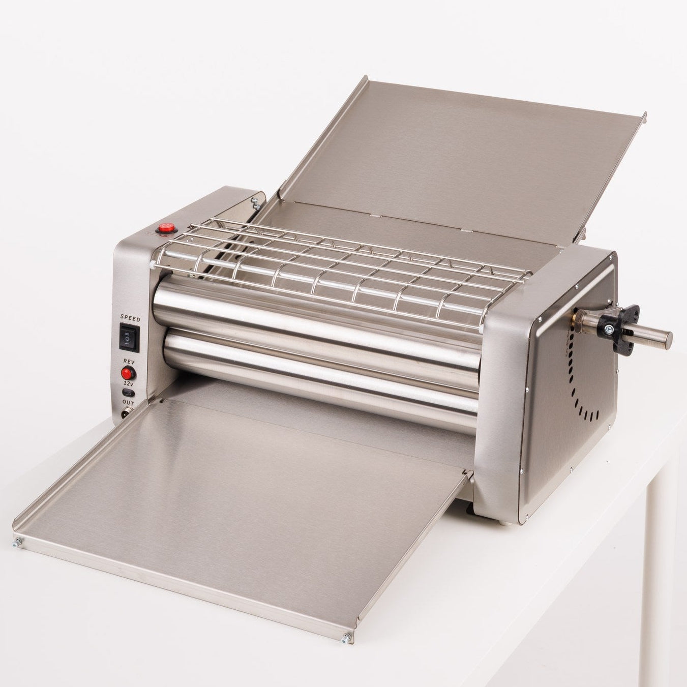 Metallic rolling pin on a white background